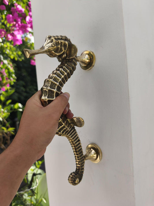 Pair of solid brass seahorse door handles in antique gold finish, handmade in Bali