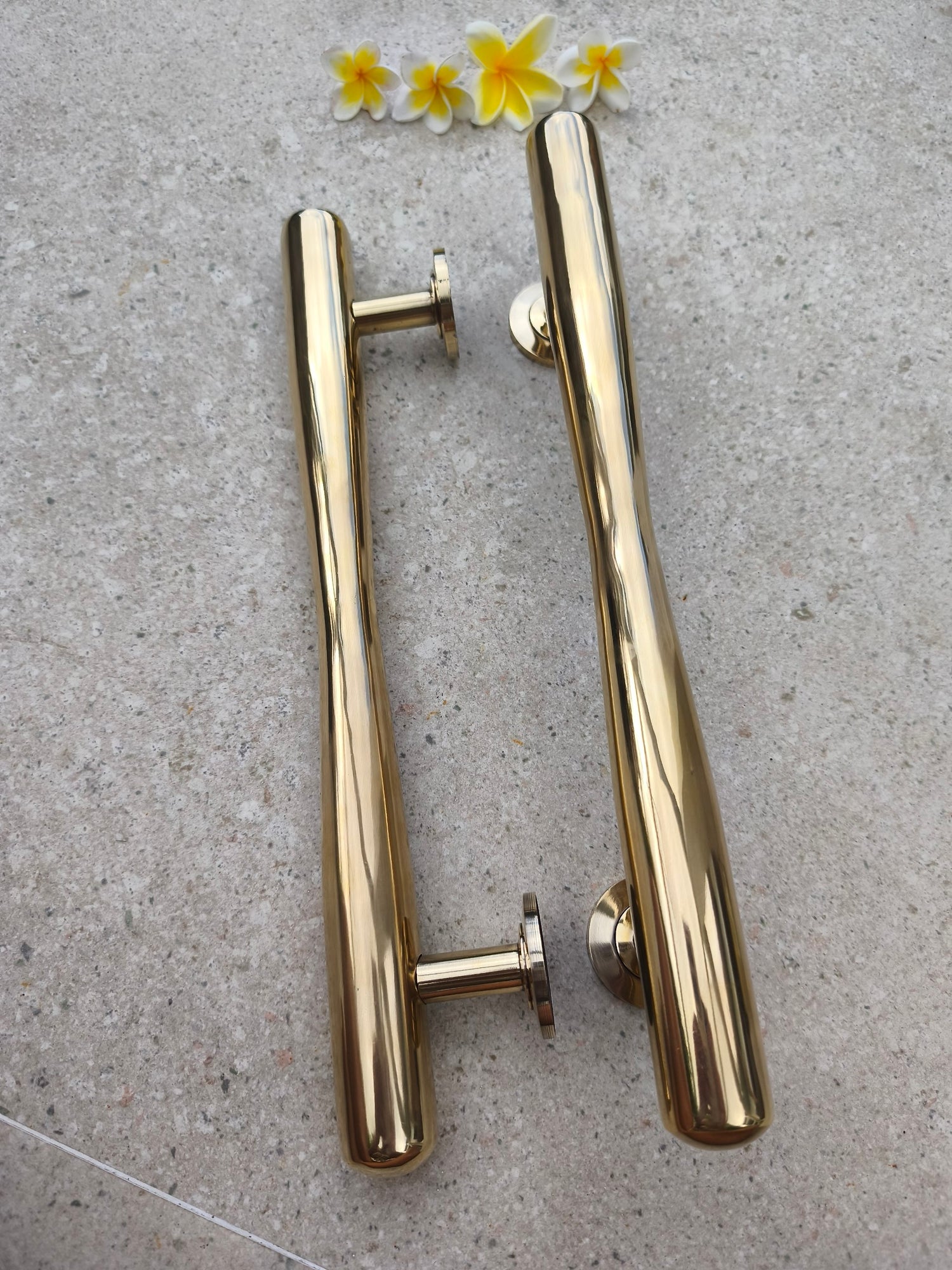 Side view of a pair of 40 cm solid brass door pull handles showing the mounting posts, polished gold tapered bar door pulls for front doors and entry doors