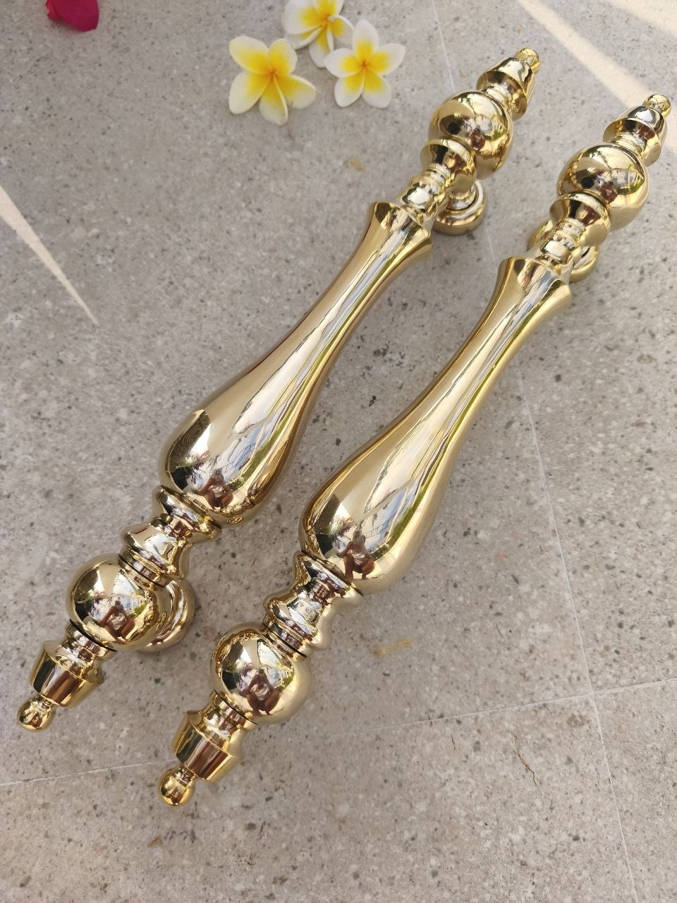 Shiny polished brass door pulls set, heavy solid brass gold handles at 3000 g per pair, durable luxury front door hardware with a timeless Victorian and European design